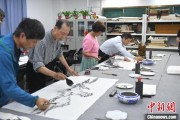 梦见洗澡两岸艺术家在安徽“共绘一幅画”